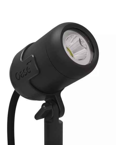 Kopf des OASE LunAqua Connect Solo weiß mit Gelenk und OASE-Logo, Linse leuchtet